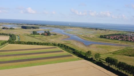 Aerial-wide-shot-of-a-surroundings-of-Waterdunes---a-nature-area-and-recreational-park-in-the-province-of-Zeeland,-The-Netherlands