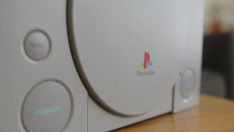 Rack-Focus-Close-Up-of-a-Classic-Sony-Playstation-Video-Game-Console