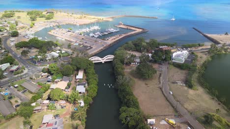 drone-aerial-panning-view-of-the-haleiwa-bridge-on-oahu-hawaii