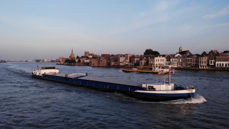 Allegria-Cargo-Ship-Passing-Another-On-Oude-Maas-In-Dordrecht