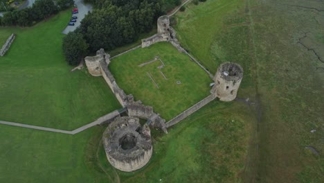 Flint-castle-Welsh-medieval-coastal-military-fortress-ruin-aerial-view-high-angle-top-down-right-rotation