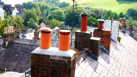 Victorian-tiled-property-rooftop-chimney-smoke-stacks-Conwy-town-northwest-Wales
