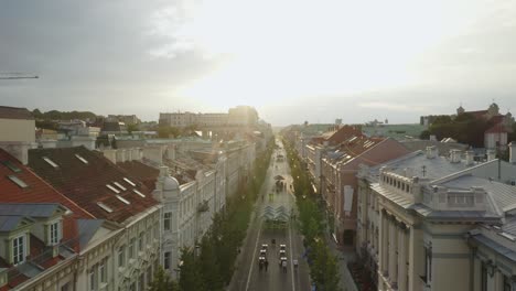 AERIAL:-Descending-Shot-of-Vilnius-Gediminas-Avenue-in-Summer-During-Weekend-with-Old-House-in-Sides