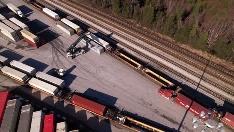 Aerial-tilt-up-reveal-of-Vancouver-shipping-terminal-and-surrounding-landscape