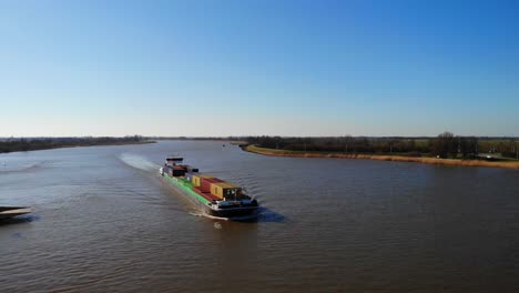 Sendo-Liner-Inland-Freighter-Navigating-Der-Lek-In-Groot-Ammers