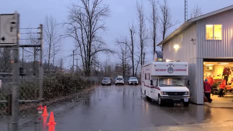 Driving-Past-Search-And-Rescue-Command-Building-With-Workers-Waiting-To-Be-Dispatched-In-Abbotsford,-Canada-on-Nov-27-2021