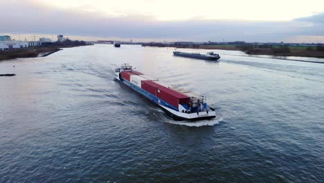 Delta-Hopper-Inland-Freighter-Carrying-Cargo-Containers-Along-Oude-Maas