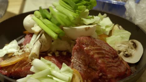 Uncooked-Beef-Meat-With-Cabbage,-Mushrooms,-And-Asparagus