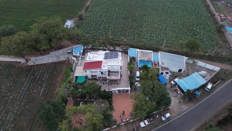 Aerial-top-down-view-of-a-hip-and-valley-pitched-roof-on-a-new-construction-luxury-single-family-house-real-estate