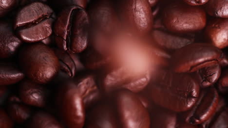 Coffee-beans-falling-down-on-coffee-beans-in-slowmotion