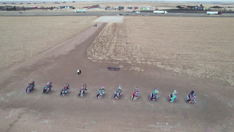 Drone-Aerial-View-of-Cadillac-Ranch,-Tourist-Attraction-by-Route-66,-Amarillo,-Texas-USA