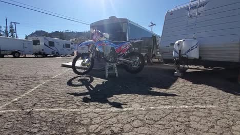A-static-shot-of-a-dirt-bike-prepped-and-ready-for-a-race