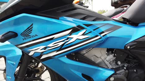 Kuala-Lumpur,-March-12,-2022---a-stunning-display-of-the-Honda-RS_X-150-motorcycle-in-a-bright-blue-color