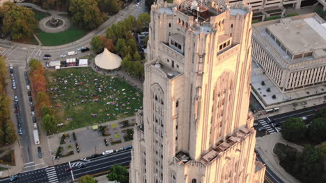 A-dusk-aerial-establishing-shot-of-the-Cathedral-of-Learning-on-the-Pitt-campus-in-Pittsburgh's-Oakland-district