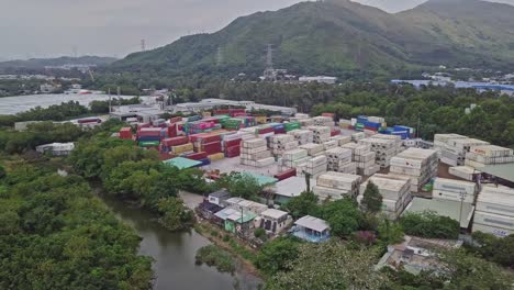 A-dynamic-aerial-footage-flying-around-a-cargo-storage-depot-in-the-town-of-Yuen-Long-in-the-western-New-Territories-of-Hong-Kong