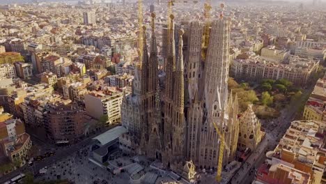 Aerial-Shot-Of-Basílica-Y-Templo-Expiatorio-De-La-Sagrada-Familia-At-Sunset