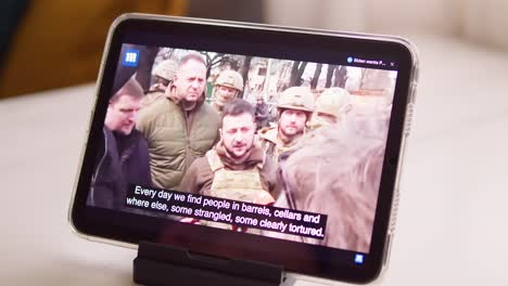 Watching-the-President-of-Ukraine-Volodymyr-Zelensky-on-News-and-giving-a-speech-online-on-the-tablet