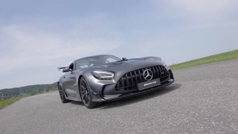 Closeup-of-Benz-Sports-Car-Front-Grill---Handheld-movement