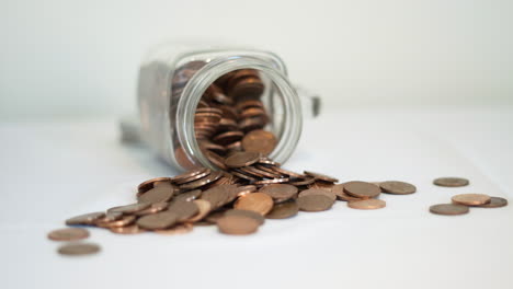 Pennies-spilling-from-a-jar