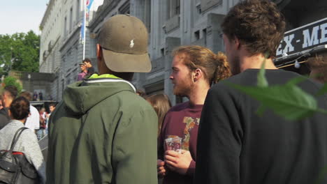 People-having-drinks-and-a-good-time-next-to-a-food-stall-and-a-wooden-skate-ramp