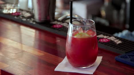 Bloody-mary-cocktail-served-with-a-straw-and-ice