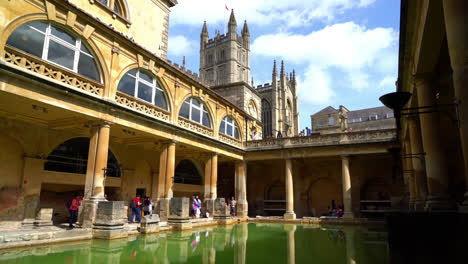 Bath-England,-Circa-:-Roman-Baths,-the-UNESCO-World-Heritage-site-with-people,-which-is-a-site-of-historical-interest-in-the-city-of-Bath,-UK