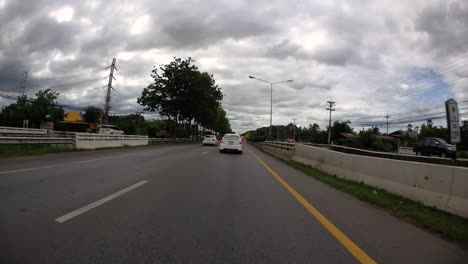 This-is-a-time-lapse-with-an-action-camera-mounted-in-front-of-the-truck,-driving-from-Pranburi-to-Hua-Hin-and-Hua-Hin-to-Bangkok-on-Phet-Kasem-Road