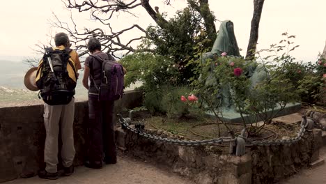 Static-Shot-of-Tourists-Enjoying-the-View-From-Mary-Magdalene-Cave-In-the-Sainte-Baume-Mountain-in-Provence,-South-of-France