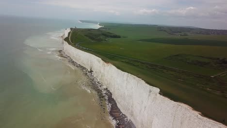 Seven-Sisters-chalk-cliffs-in-England,-dramatic-aerial-view