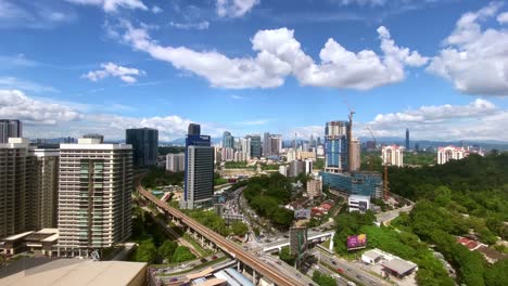 Malaysian-Cityscape-During-the-Day---Highway-and-Traffic-Surrounded-by-Buildings