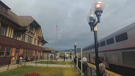 Standing-outside-Whitefish-station-in-Montana-looking-at-a-silver-train-about-to-depart