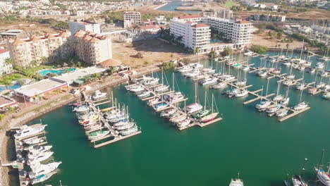 Aerial-overview-of-beautiful-harbor-near-luxurious-hotels-in-sunny-Mexico