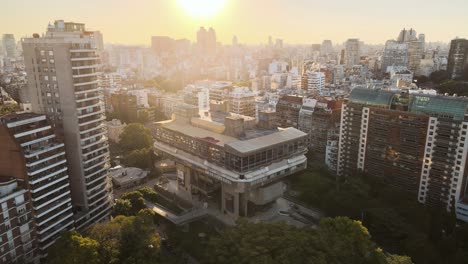 Aerial-orbiting-view-of-National-Library-at-golden-hour-in-Buenos-Aires-city
