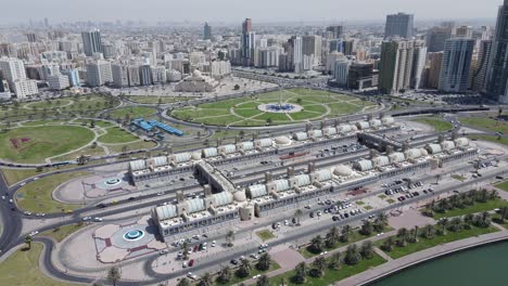 4K:-Drone-view-of-Sharjah's-Central-Souq-with-city-skyline-on-a-bright-sunny-day,-United-Arab-Emirates