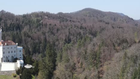 Rolling-hills-with-vegetation-just-awaking-in-Spring-surrounds-castle-Trakoscan-in-Croatia