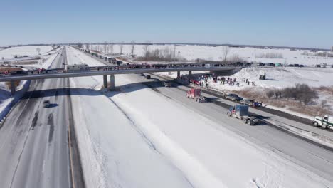 Aerial-spinning-to-show-the-convoy-and-supporters