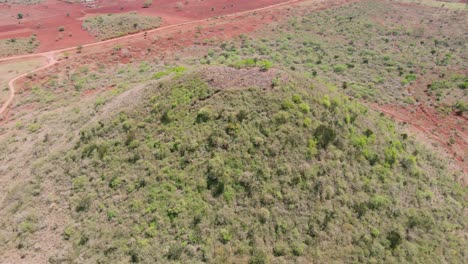 Drone-Mavic-Air-2-flying-over-the-hill-in-the-Africa-savanna-desert-zone