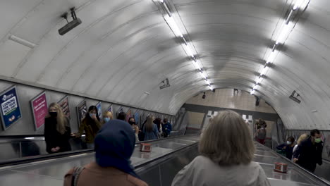 Going-Down-Escalator-At-Bond-Street-Station-In-London