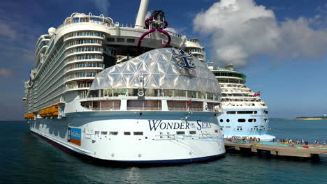 Rotating-drone-shot-of-the-aft-of-the-Wonder-Of-The-Seas-Royal-Caribbean-cruise-ship-at-dock