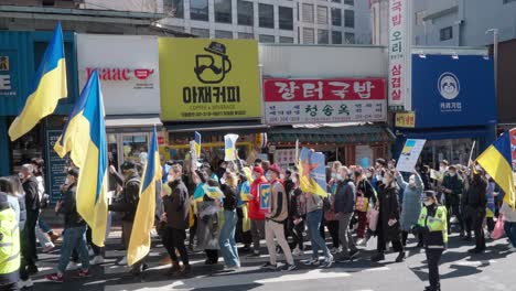 Ukrainian-people-with-Posters-and-Flags-During-a-March-against-Russian-war-in-Ukraine