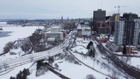 Aerial-drone-view-of-Ottawa-in-winter-with-snow,-Ontario,-Canada