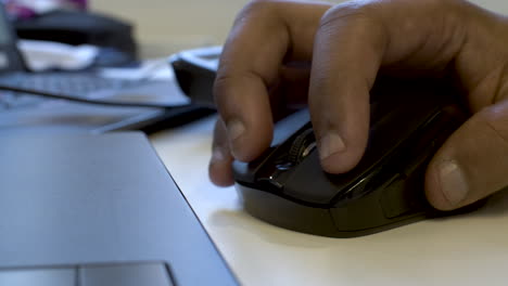 Close-Up-Of-Ethnic-Minority-Male-Hand-Using-Computer-Mouse