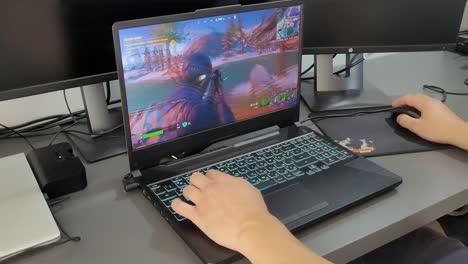 Playing-and-dying-in-Fortnite-on-a-gaming-laptop