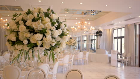Elegant-table-setting-with-glassware-at-luxury-hotel-wedding,-gimbal-shot
