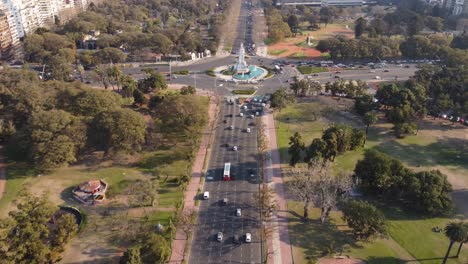 Aerial-forward-over-Buenos-Aires-city-with-Bosques-de-Palermo-Park-and-Monument-to-Carta-Magna