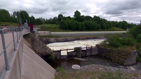 Water-Flowing-Out-Of-Lock,-Hydroelectric-Power,-Side-Static-View,-Medium