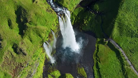 Mountain-Seljalandsfoss-Waterfall-In-South-Iceland-During-Summer---aerial-drone-shot