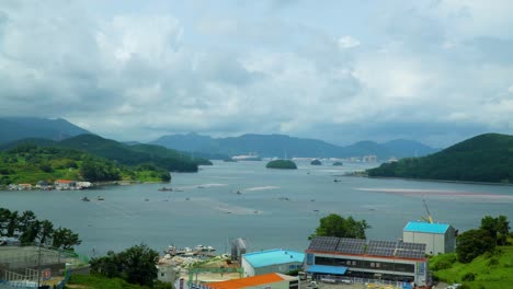 The-peaceful-bay,-mountains,-island-an-peninsula-as-seen-from-Geojedo-Island,-South-Korea---static-wide-angle-view