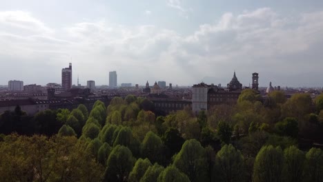 Cinematinc-60fps-aerial-shot-revealing-beautiful-city-behind-trees