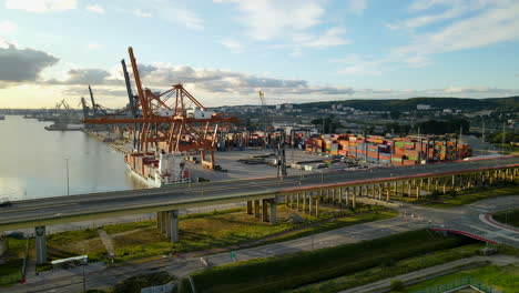 Overpass-Near-Shipyard-In-Port-Of-Gdynia-During-Sunrise,-Gdansk-Bay,-Baltic-Sea-In-Gdynia,-Poland